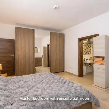 Апартаменты The Terraces Seafront Getaway Malta 3 Bedroom